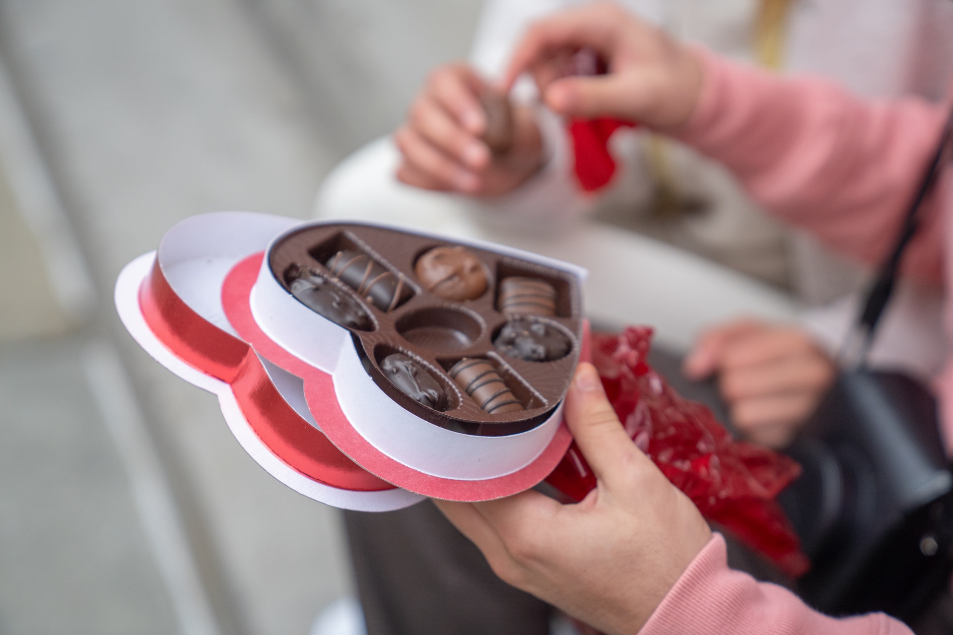 people sharing valentine's day chocolates at our luxury apartments in San Antonio