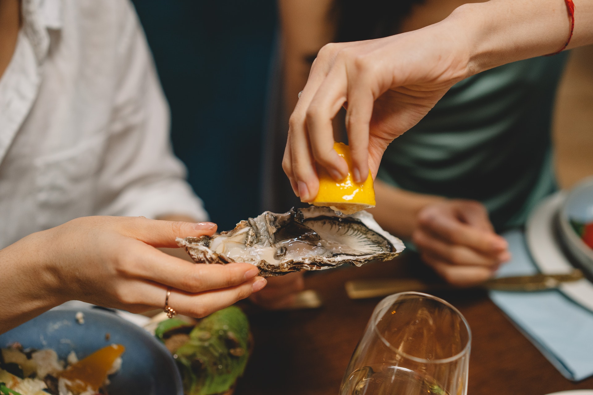 Houston residents eating oysters