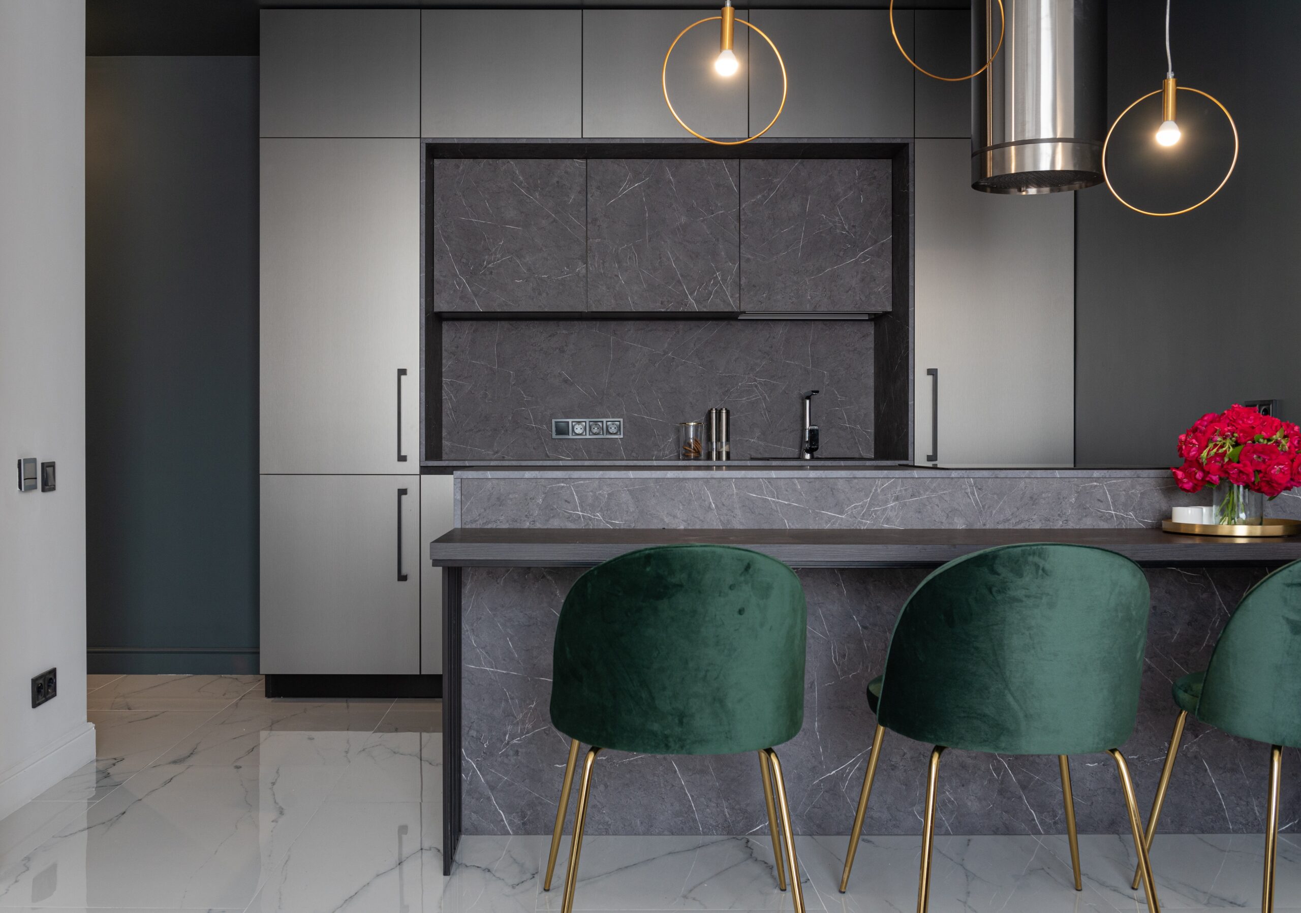 north austin luxury apartment midcentury modern design dark cabinets velvet emerald green barstools