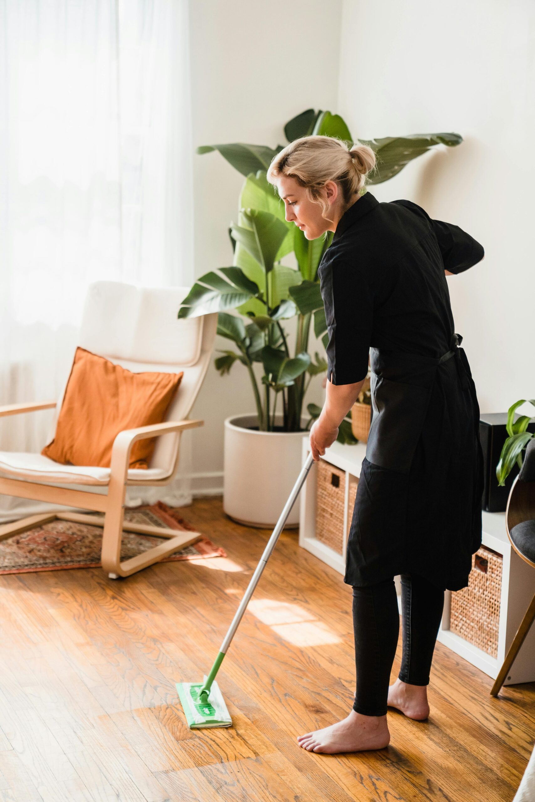 spring cleaning tips rpm living blog woman cleaning apartment
